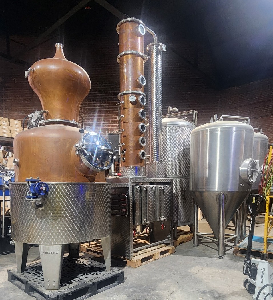 Danger Distillery's copper still and stainless-steel tanks inside the Tampa distillery