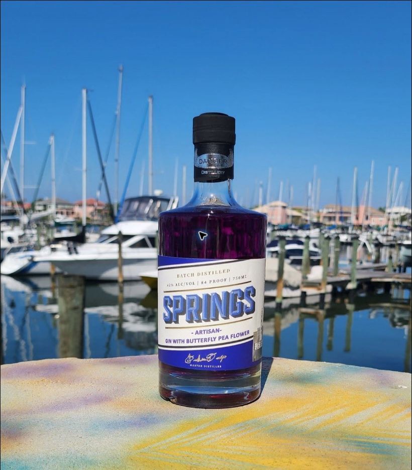 Springs Artisan Gin bottle at a Florida marina